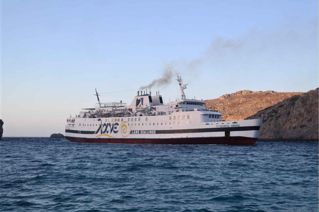 Ferry Arriving at Kythera Harbour Large passenger ferry arriving at the rugged island harbor of Kythera - Hike Greece